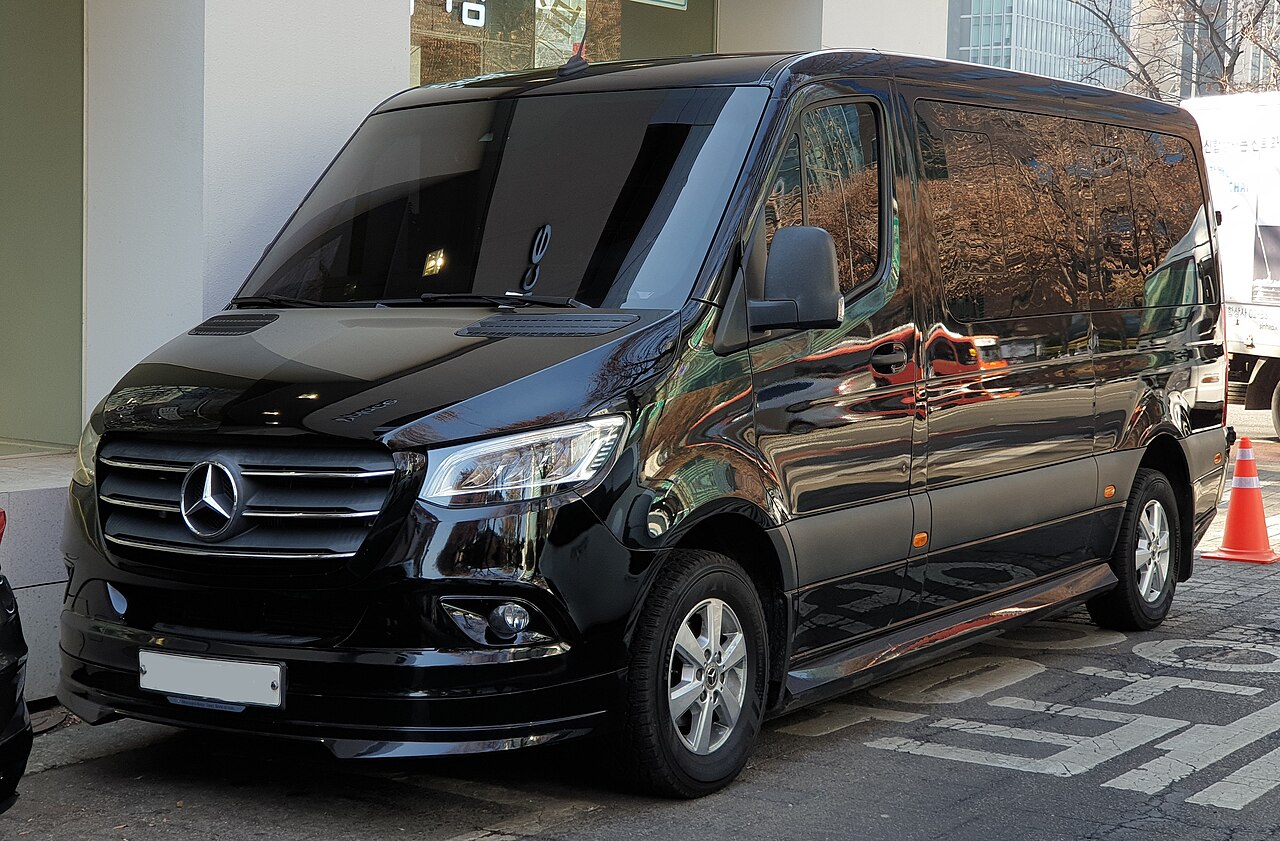 Black Mercedes-Benz Sprinter passenger van